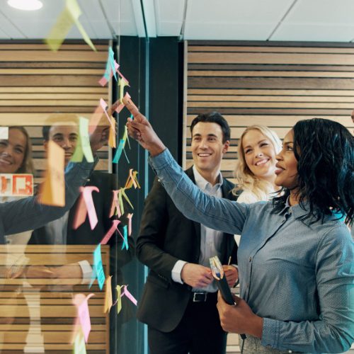 A photo of business corporate executives and their team building topical maps for future of seo